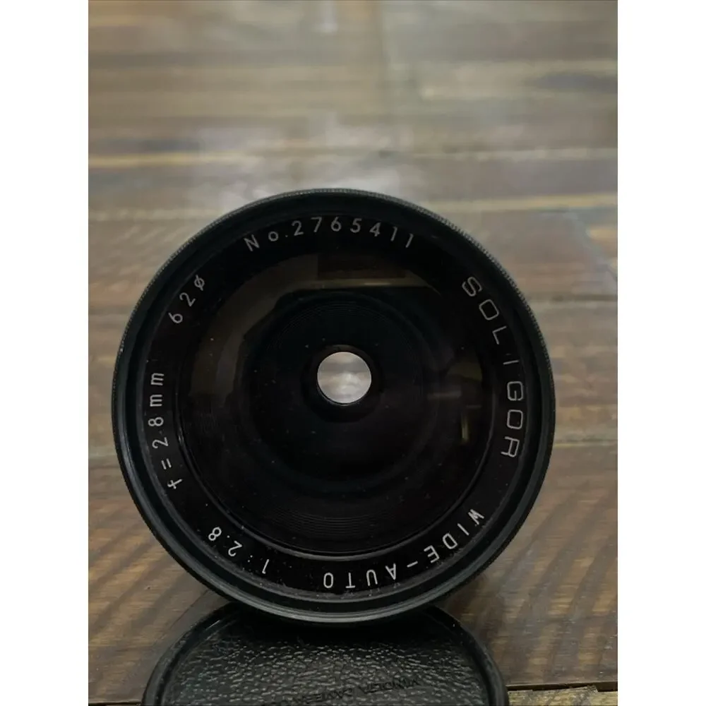 SOLIGOR Wide Auto 28mm f/2.8 Camera Lens W/ Hoya 62mm Skylight (1B) Japan